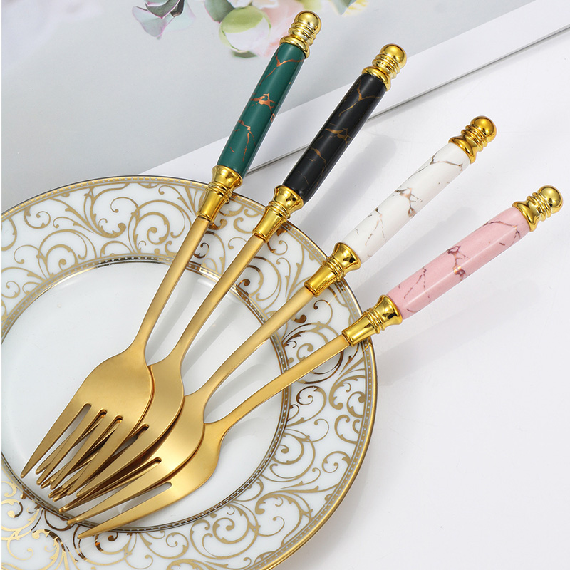 Porcelain flatware stainless steel gold cutlery set with ceramic pink black white handle